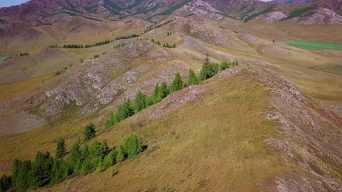 Beautiful flight over the top of the mountain Stock Footage 166483963
