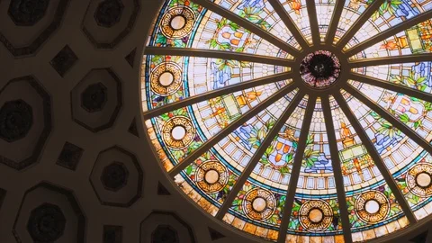 Beautiful floating capture of architectural details of ceiling stained glass art Stock Footage 103103741