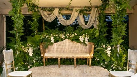Beautiful flora and rustic wedding decoration idea using white orchid Stock Photos