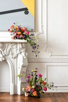 Beautiful flower composition in a modern boho interior Stock Photos