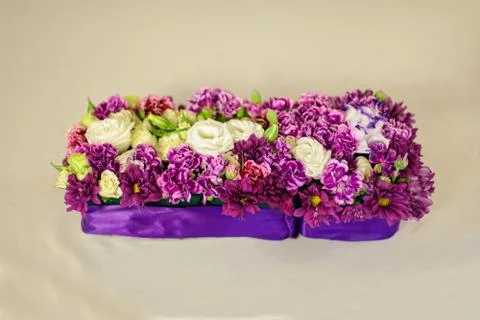 Beautiful flower composition on the wedding table Stock Photos