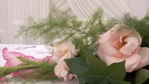 Beautiful flower decorations on the wedding table Stock Footage