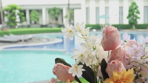 Beautiful flower vases on a buffet table with beverages and food ready for dinne Stock Footage 287857206