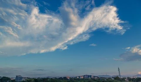 A beautiful fluffy clouds with blue background sky in Pune Stock Photos
