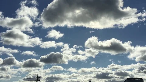 Beautiful Fluffy Clouds Moving Slowly on a clear Autumn Day (HD, Slo-Mo) 動画素材 84676530