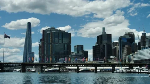 Beautiful fluffy clouds over Darling Harbour in Sydney 4K Stock Footage 166074347