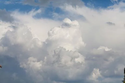 Beautiful fluffy clouds in sky Foto stock