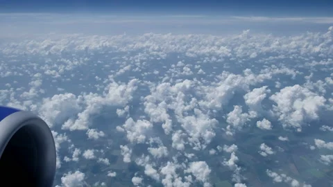 Beautiful fluffy clouds from window airplane. Airplane flight. Traveling concept Stock-Footage 158896950