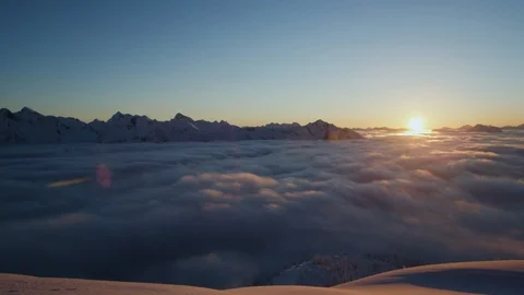 Beautiful fluffy clouds on winter landscape at sunset Stock Footage 116784156