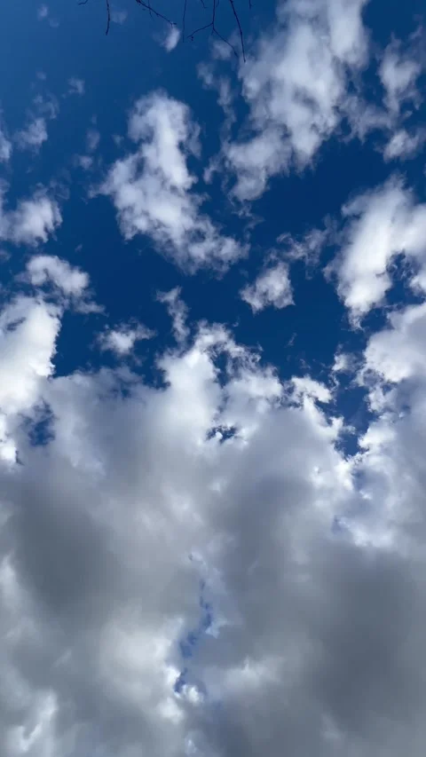 Beautiful fluffy white cloud against the blue sky. Sky clouds.  Stock Footage 282240790