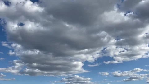 Beautiful fluffy white cloud against the blue sky.  Stock Footage 282240796