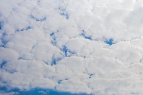 Beautiful fluffy white clouds or Altocumulus with blue sky and Sunlight, Natu Stock Photos