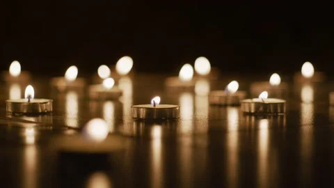 Beautiful Focus Pull Tealight Candles Stock Footage 147475626