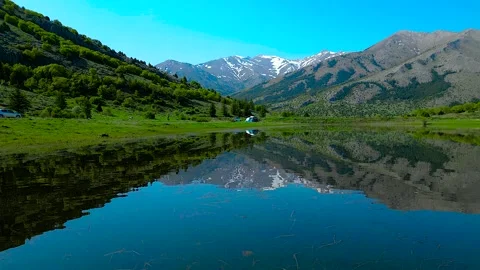 A beautiful forest and a lake view next to it Vidéo 274136295