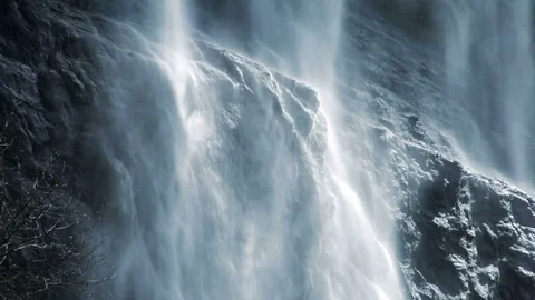 Beautiful fresh spring water dropping down on natural waterfall Stock Footage 72870133