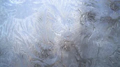 Beautiful frost pattern on a window glass Stock Footage 148560965