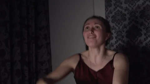 Beautiful gamer won round in console game, expression, joy of victory, screams Stock Footage 119072010