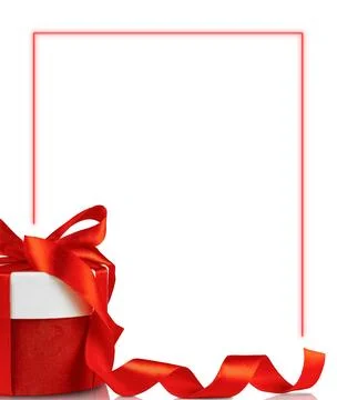 Beautiful gift box with red bow and ribbons. Stock Photos
