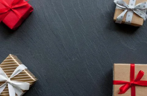Beautiful gift boxes on black background Stock Photos