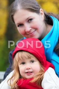 Beautiful girl and mom portrait Stock Photos