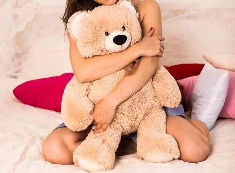 Beautiful girl with big teddy bear Stock Photos