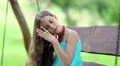 Beautiful girl combs his long hair HD Footage