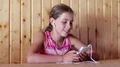 Beautiful girl communicates via smartphone HD Footage