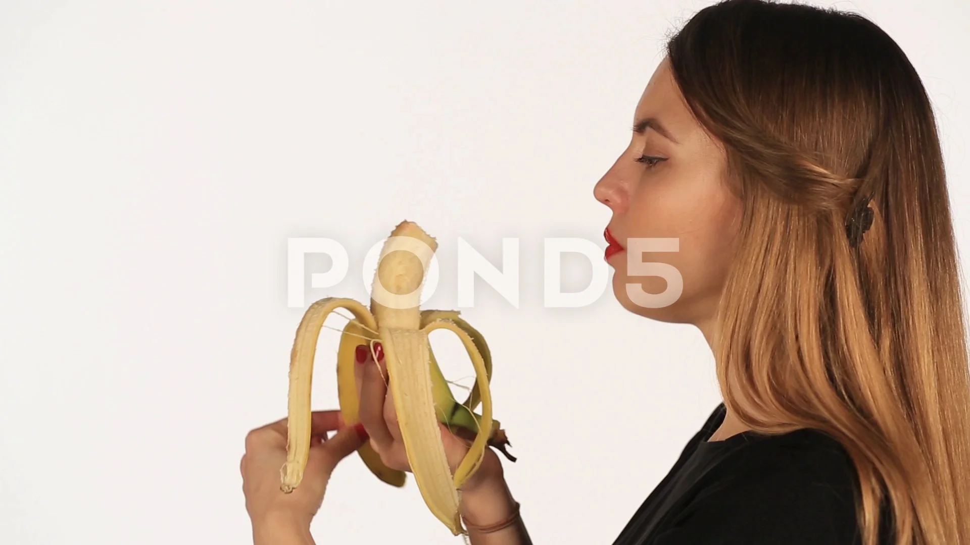 girl eating banana