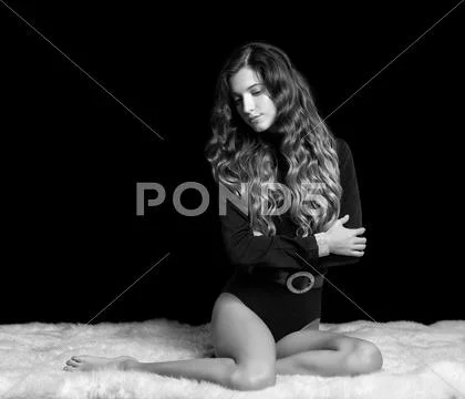 Beautiful girl on furs Stock Photos