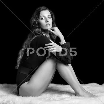 Beautiful girl on furs Stock Photos