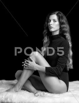 Beautiful girl on furs Stock Photos