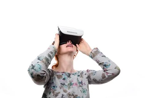 Beautiful girl getting experience using VR-headset glasses of virtual reality Stock Photos