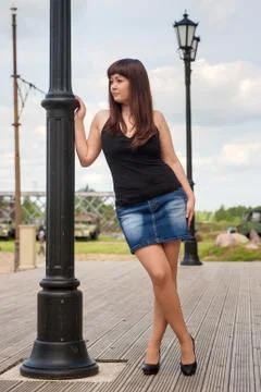 Beautiful girl on lantern. Stock Photos