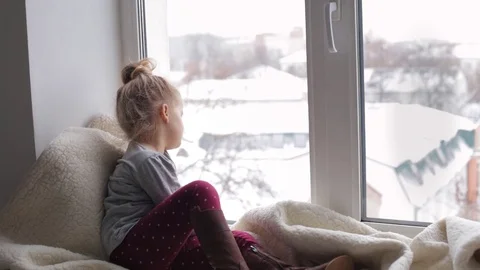 Beautiful girl lying on a window sill Stock Footage 69991663