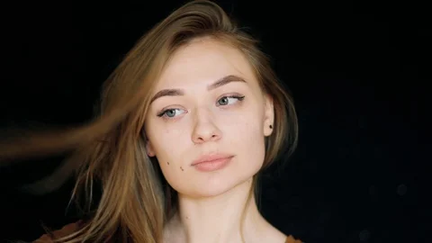 Beautiful girl model posing on the camera. The woman is very nice. Close-up Stock Footage 88826902