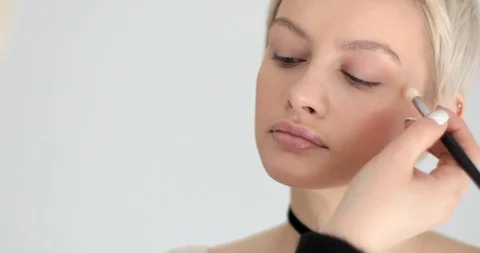 Beautiful girl model posing doing make up inside beauty salon copy space  Stock Footage 90929167