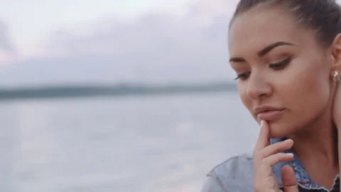 Beautiful girl posing on camera Stock Footage 71099998