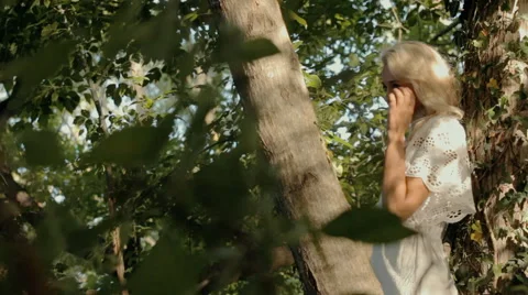 Beautiful girl posing in forest Stock Footage 59380652