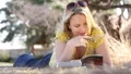 Beautiful Girl Reading in Park 4955 HD Footage