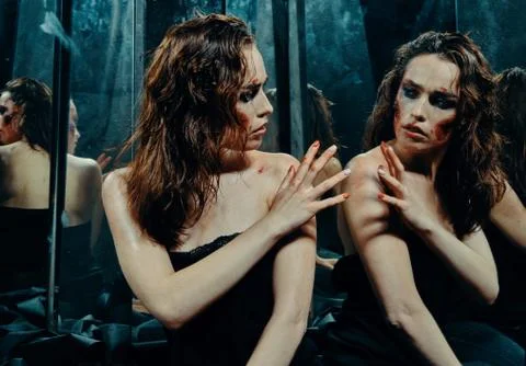 Beautiful girl with a scared face in the blood Stock Photos