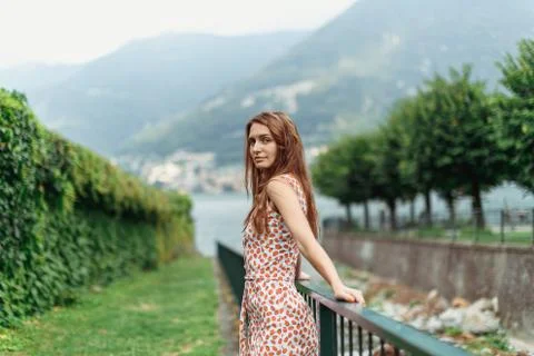 Beautiful girl on the shores of Lake Como Stock Photos