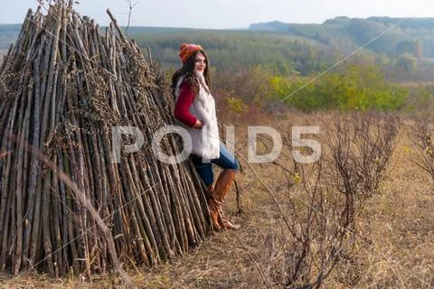 Beautiful girl smiling at the camera, in stylish fashion clothes in autumn Stock Photos