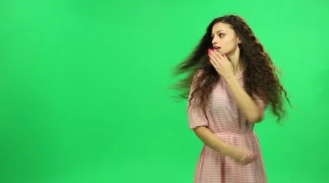 Beautiful girl spinning around,smiling,make a diffrent emotions, green screen Stock Footage 45597235