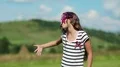 Beautiful girl stands on meadow and sings a song HD Footage