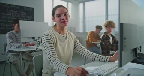 Beautiful Girl Studies Game Development in University Computer Lab Stock Footage 318517189