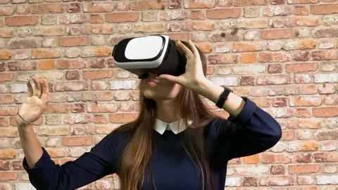 Beautiful girl using 3D virtual reality headset. , not love it Video stock 114292835