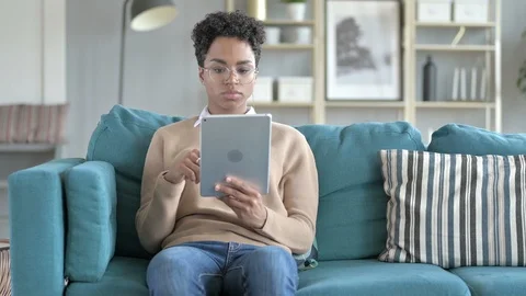 Beautiful Girl is Using Digital Tablet Stock Footage 114788729