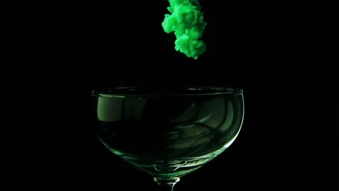 Beautiful glass goblet envelops thick green smoke. Stock Footage 88637600