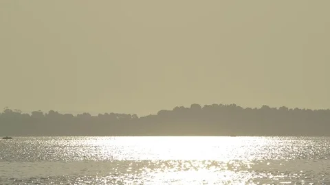 Beautiful gold sun light at sunset with sun reflection Stock Footage 71649720