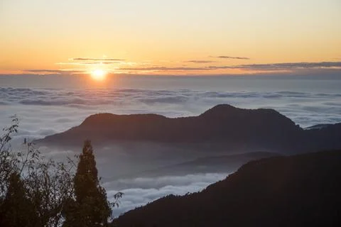 Beautiful golden sunset with dramatic cloud formation 스톡 사진